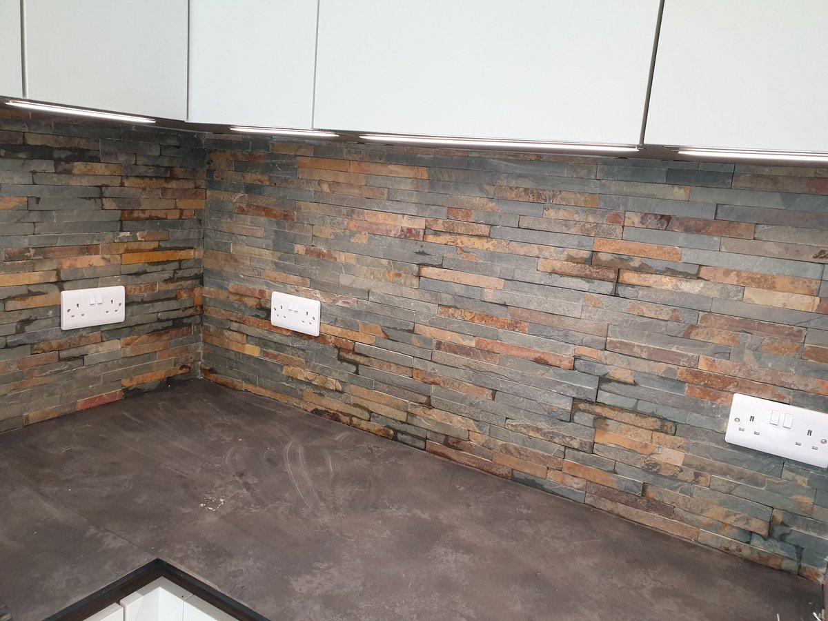 Split face slate tiles fitted this morning on a #kitchen we have previously fitted.