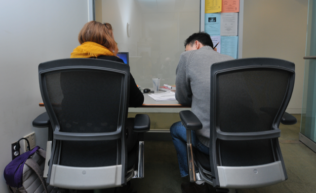 UMass Boston student meeting with a tutor