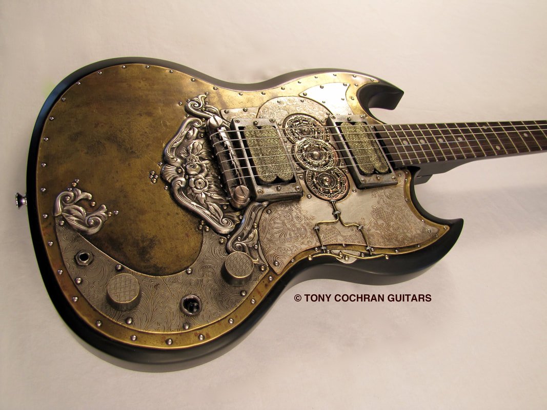 Tony Cochran Guitars (@tcochranguitars) on Twitter photo Wow! Many guessed this week's detail post - Doubloon #guitar! tonycochranguitars.com/doubloon.html"... cost him his life in a dance hall in New Jersey when Amaya... shot him dead at...You can still see the powder burns on the brass near the jack socket." @ArtMakesCbus <a href="/GCAC_Cbus/">GCAC</a> <a href="/CityScene/">CityScene Magazine</a> Wow! Many guessed this week's detail post - Doubloon #guitar! tonycochranguitars.com/doubloon.html"... cost him his life in a dance hall in New Jersey when Amaya... shot him dead at...You can still see the powder burns on the brass near the jack socket." @ArtMakesCbus <a href="/GCAC_Cbus/">GCAC</a> <a href="/CityScene/">CityScene Magazine</a>