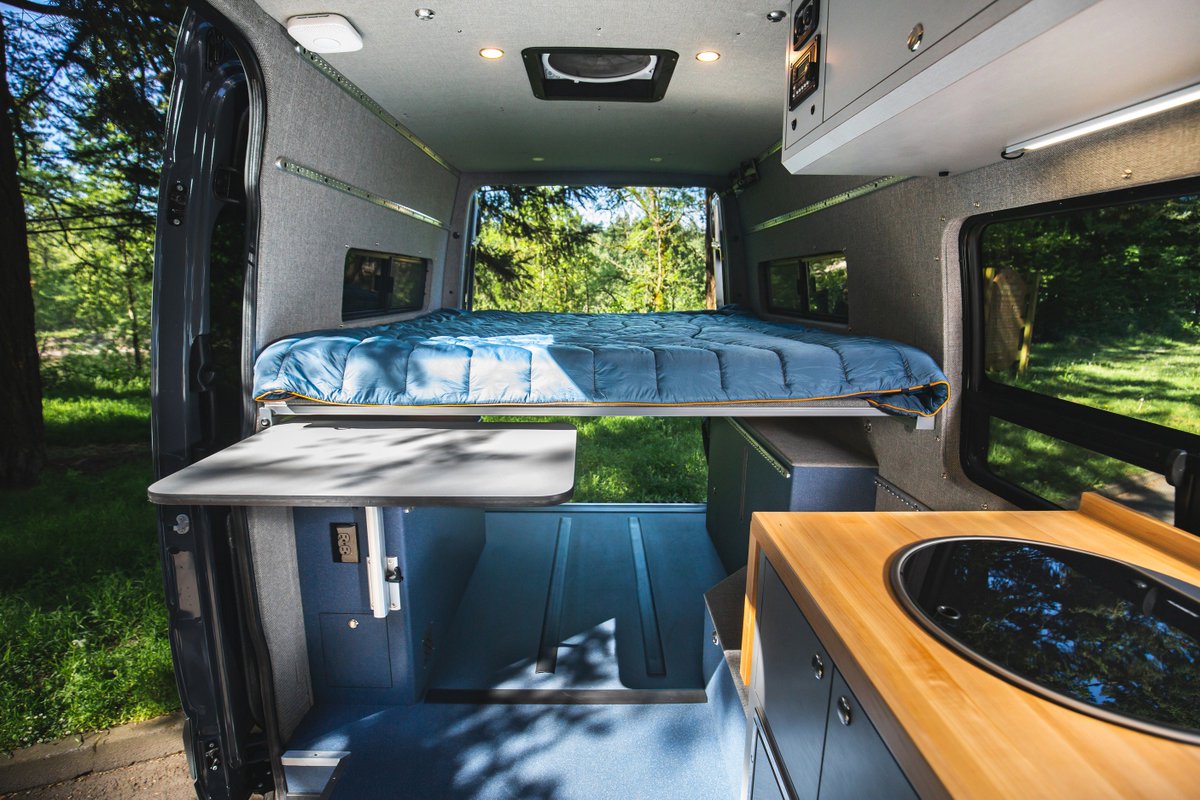 Outsidevan's tweet photo. Echo is our latest custom Peak Series build to hit the road! This layout is simple, yet provides all the necessities for adventures on the road and off the grid. For more photos and info visit https://t.co/vhd5rmsj6D https://t.co/WDxsZsoweb