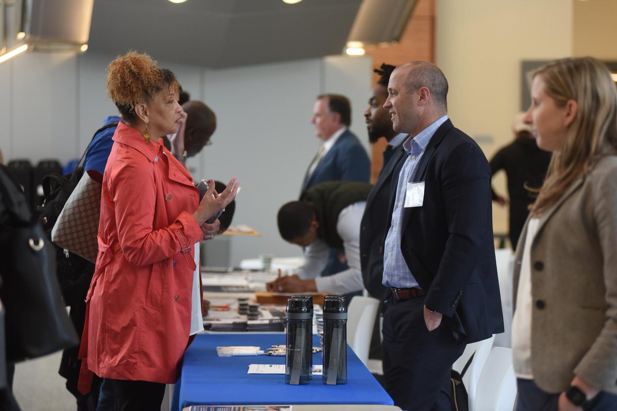 Attendees visit info tables