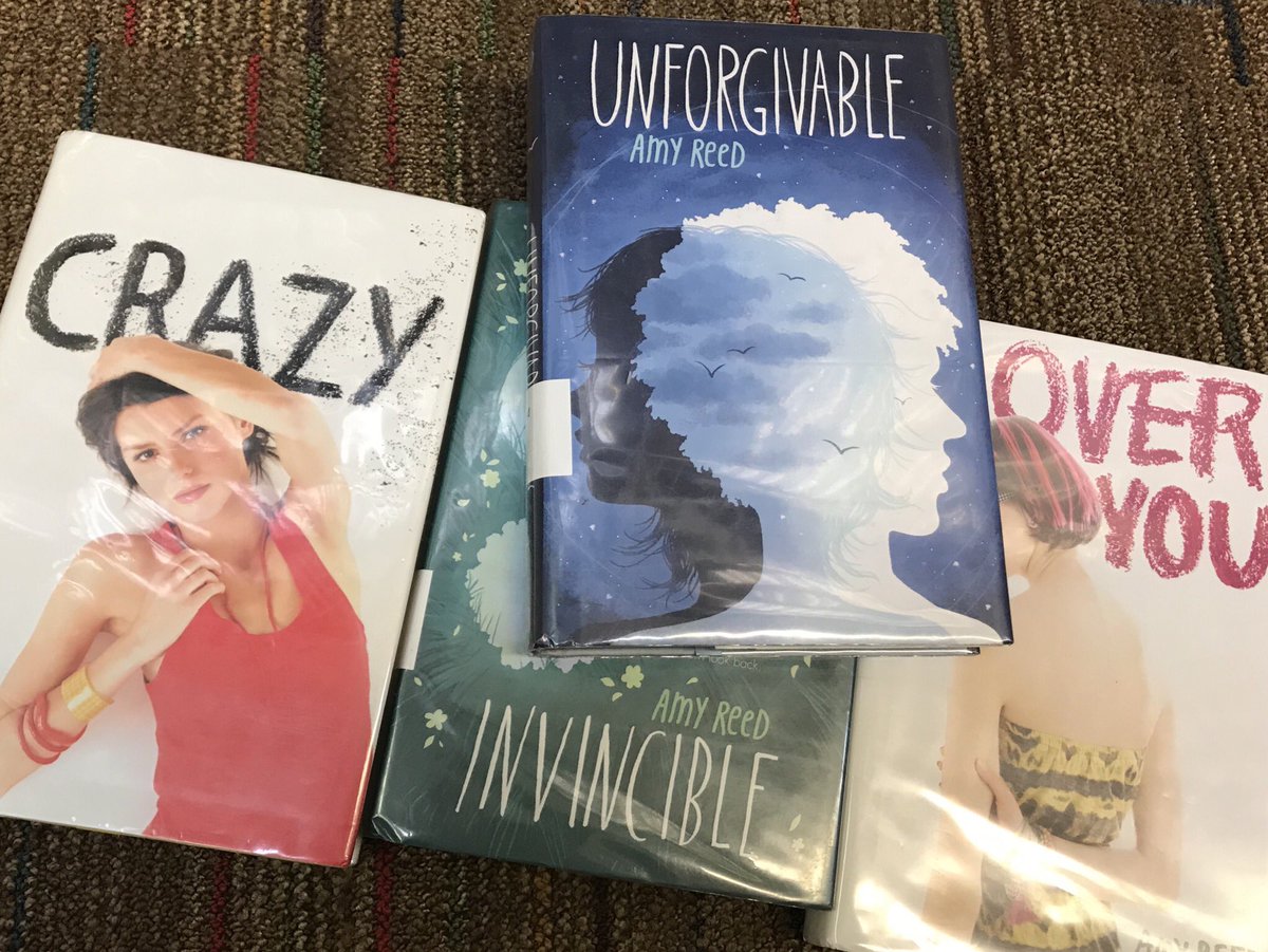Cassandrahaven's tweet photo. @amyreedfiction my trip to pay library fines got out of hand https://t.co/bOjUqKietT