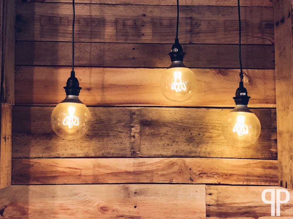 There's something about the glow of bare bulbs on reclaimed wood that just feels well... good. Allow me to introduce you to Pallet Perfect: palletperfect.com