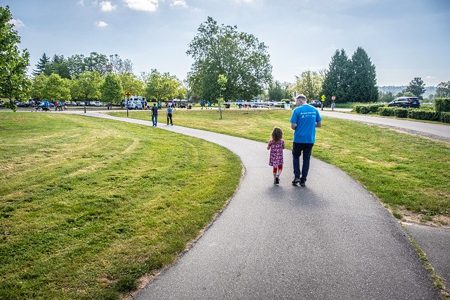 Dow and his daughter walk in a King County park.
