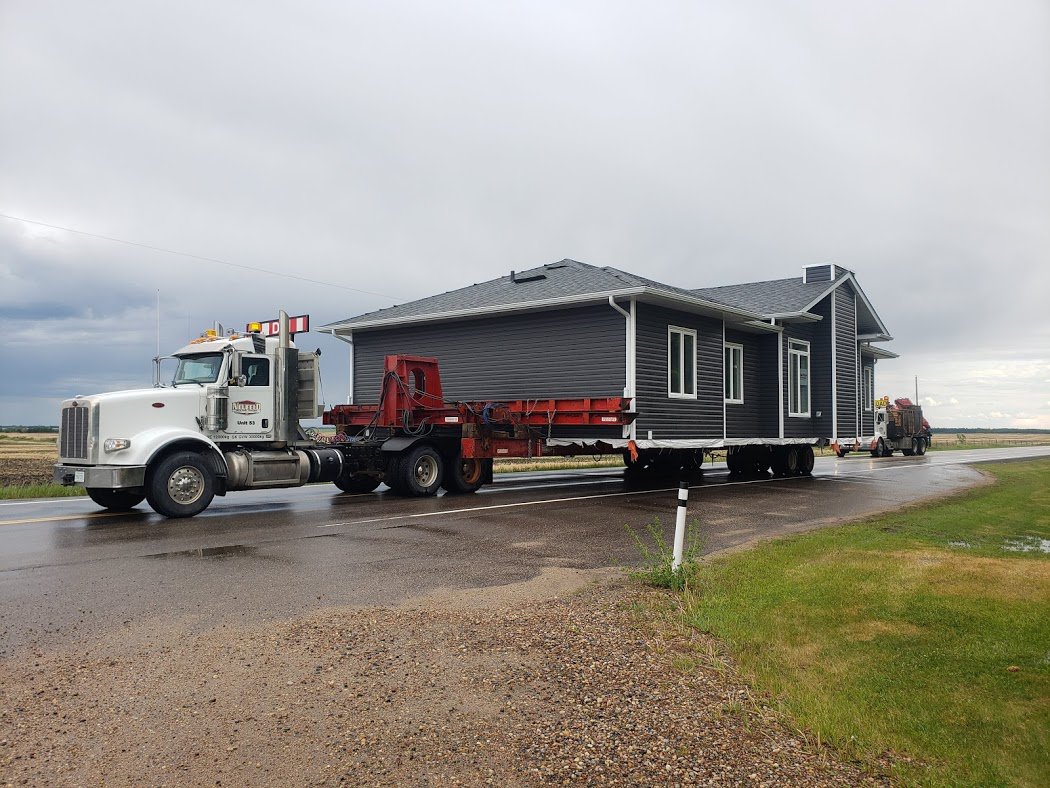 Neufeldbuilding's tweet photo. This home was moved from Nelson Homes to Bonnyville, Alberta this week.  Good work William, Ryan Harder, Matt and Boston !! https://t.co/gC7Agnu763