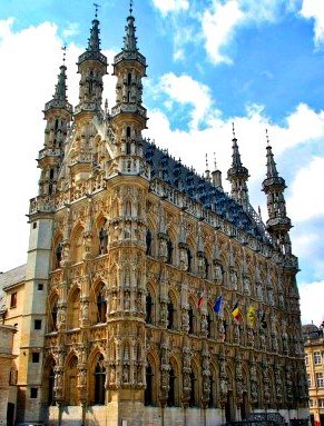 Detail, Statues on the facade of the Gothic town hall of Leuven began building 1439 in Flanders, Belgium