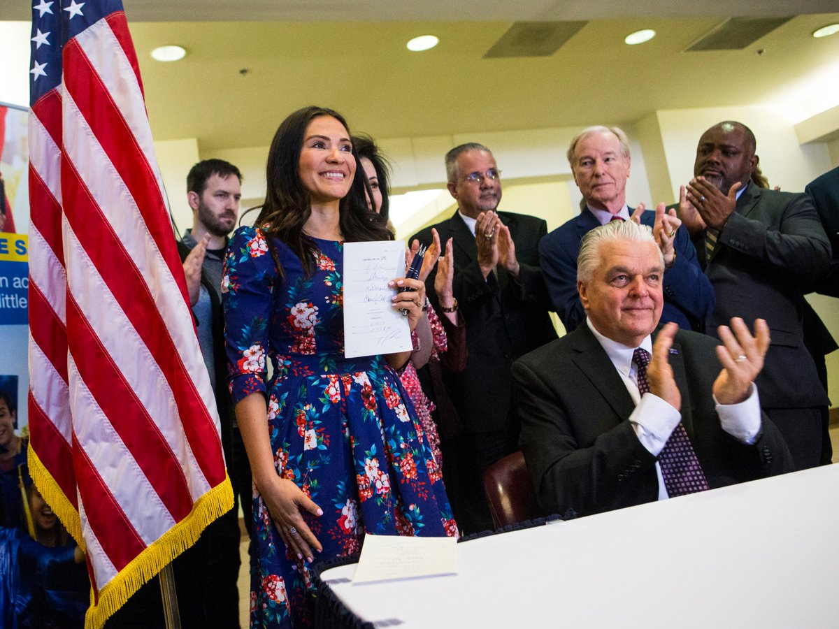 CSStevensphoto's tweet photo. Nevada Gov. @SteveSisolak pauses before signing a trio of bills, including #AB291, a comprehensive gun safety bill, alongside Oct. 1 survivor and Assemblywoman @sandra4nv and Speaker @JasonFrierson, at the Sawyer Building in Las Vegas https://t.co/BGKTYYAhrb