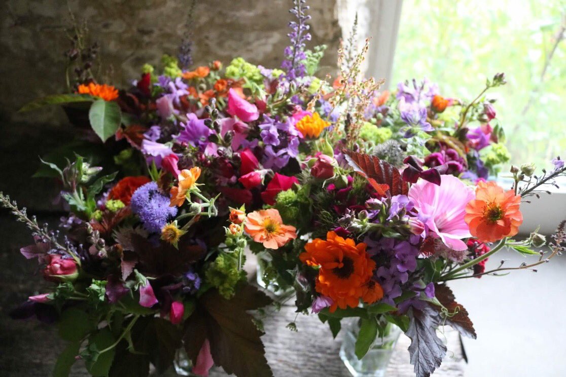 We call this a #bucketsandposies wedding. Wonderful colour mix chosen by clever bride. #pinkandorange #weddingflowers #somersetflowers #grownnotflown #britishflowers #BritishFlowersWeek xxx