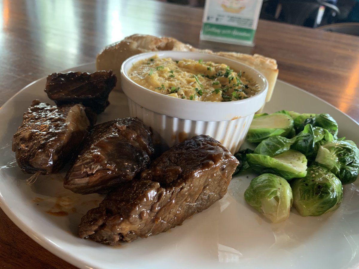 UplandIndy's tweet photo. Bad Elmer’s Braised Short Ribs are now on the menu at College Ave. If they were any more tender... they’d be served on a bun. Comes with seasoned Brussels, polenta, and French baguette! https://t.co/42QlWodDhq