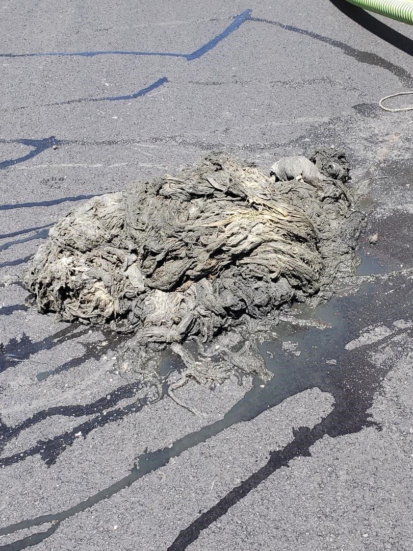 NYCWater's tweet photo. We haven’t had a #FatbergFriday in a minute, have we? We’re bringing it back with this glob of rags pulled out of a sewer on 229 St #inQueens! This is….unacceptable. Who? Why? How? #FatbergFreeNYC https://t.co/Epy24xhfA0