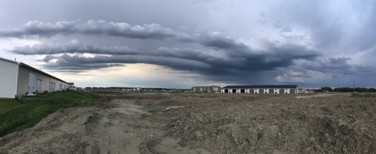 701style's tweet photo. @jaredpiepenburg any idea what causes these long horizontal clouds next to the t storm in Mandan? Is it come kind of a roll cloud? https://t.co/OlQo6bZQSS