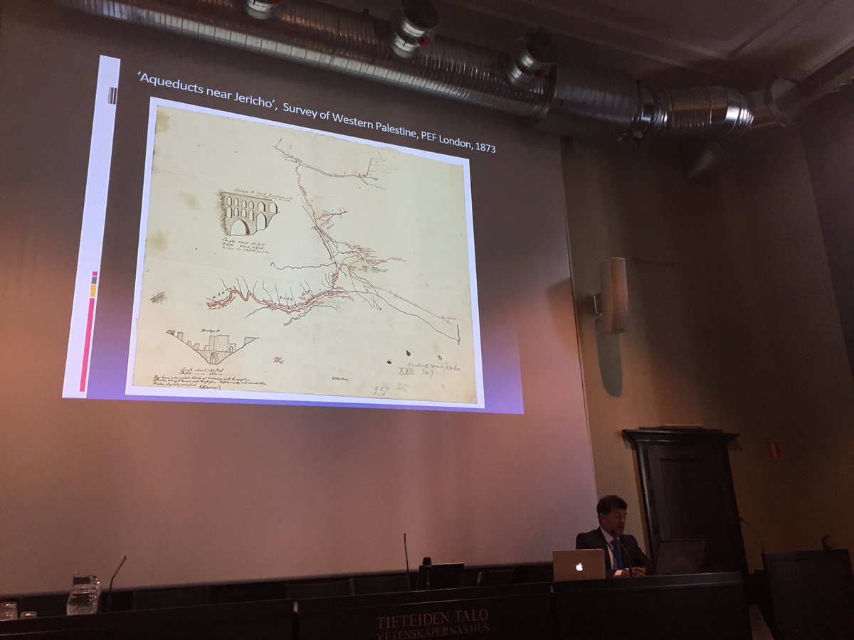 Ch_Fiaccavento's tweet photo. Mahmoud Hawari, former director of the #PalestinianMuseum, talking about Hisham Palace in #Jericho, showing a map from @PalExFund #archives, now in #Helsinki https://t.co/plYCeblfnu