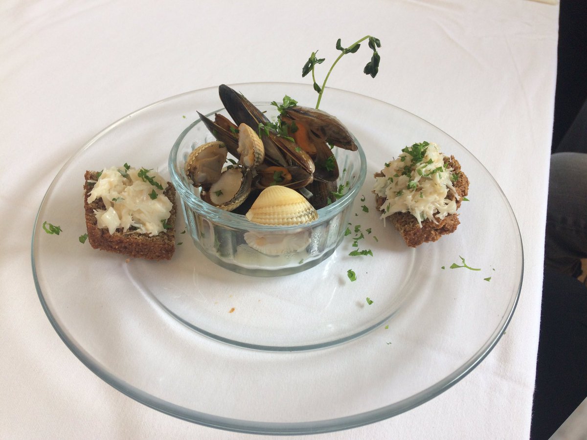 Vanessa & Tim @cooksacademy    
introducing our US visitors to the joys of Irish food - baking soda bread, smoking Irish salmon over turf and cooking cockles, mussels and fresh Kerry crab - and then we get to eat it all! Thanks to @Failte_Ireland for organizing. #WhyIrishWhiskey