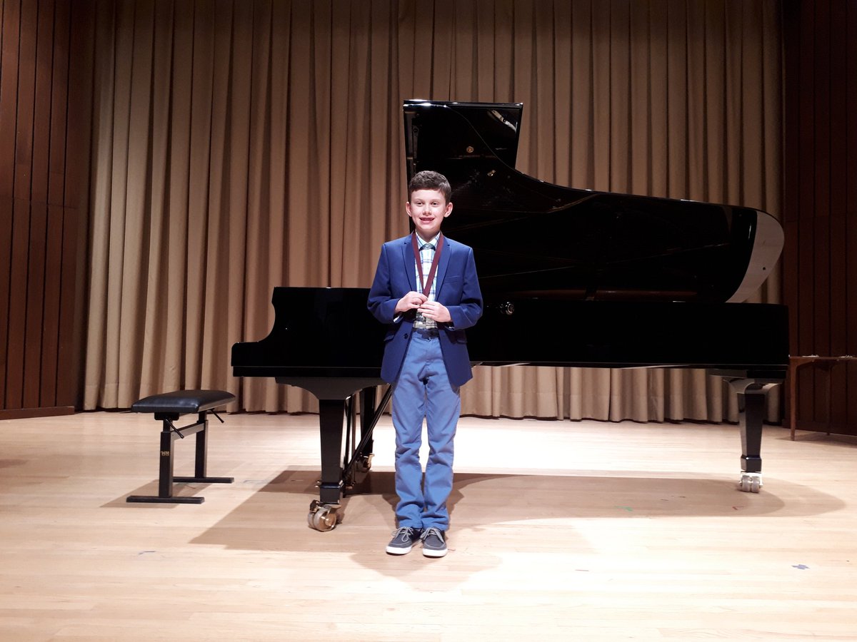TonyMcAffee's tweet photo. Mitchell received his medal this afternoon at Mount A. He performed in the recital flawlessly.  Congrats to Mitch and all of the medal winners! #mountallisonpiano #medalwinners https://t.co/DHGGBnd88g