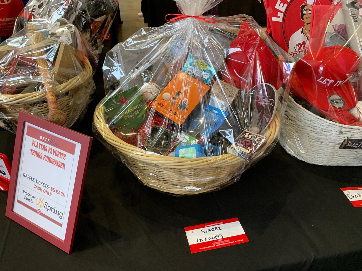 Reds's tweet photo. Stop by the Reds wives' "Players' Favorite Things" raffle inside the main gates at today's game to bid on your chance to win baskets featuring food, personal care items, gift cards, apparel and even autographed gear. Makes a great gift for dad!

Proceeds benefit @UpSpringCincy. https://t.co/o7ZxB2SMgl