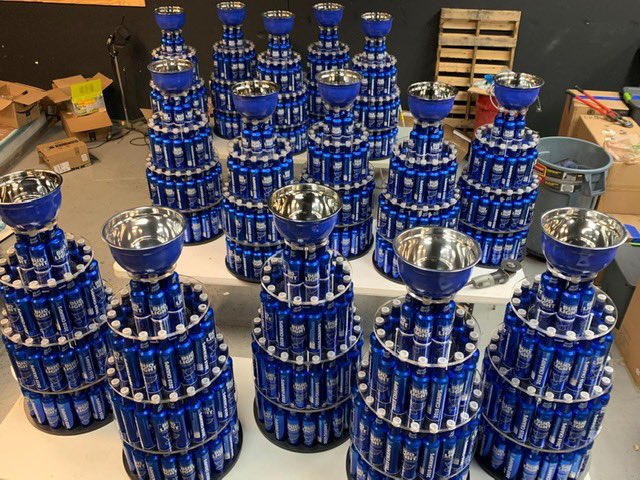 darrenrovell's tweet photo. “Bud Light Cups” that will be distributed to bars in St. Louis tonight to continue the St. Louis Blues title celebration, made out of limited-edition Blues championship bottles. https://t.co/C8Jxj11kYG