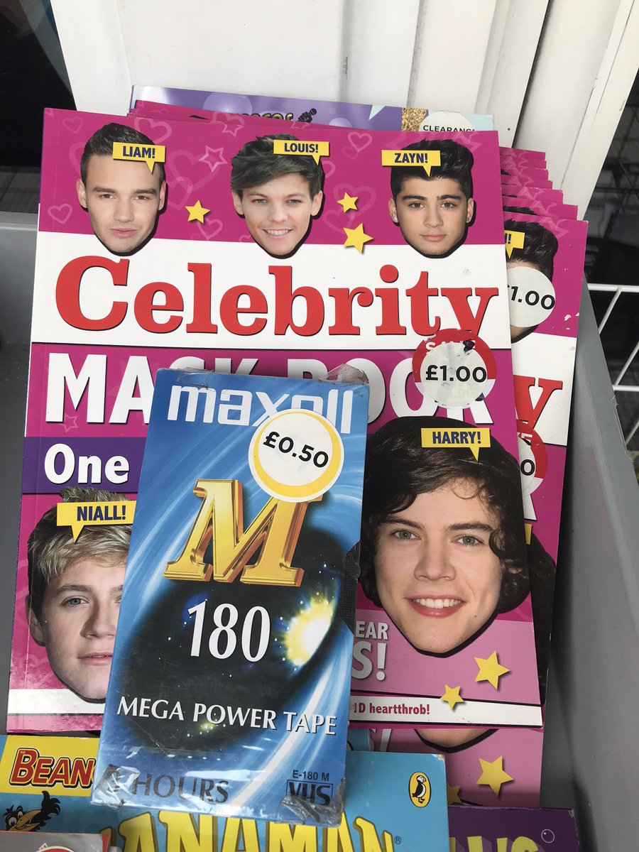 SylviaParry's tweet photo. @WHS_Carpet I just donβt know. I really really need the VHS tape but the 1direction cutout face masks is sorely tempting. And in a basket outside the store too. #tookmeback https://t.co/Js9YEXiizt