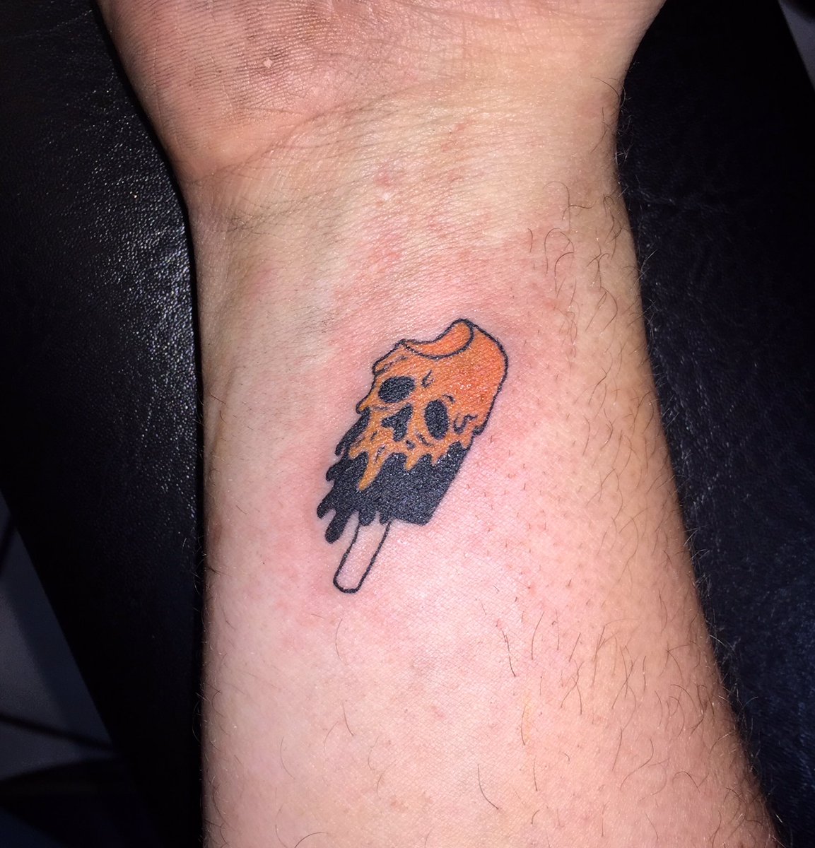 Adorable skull creamsicle done on the wrist from our June flash sale by  Leana! - - - #zebratattooz #zebratattoozstreetsboro #icecream  #icecreamtattoo #skulltattoo #skull #tattoo #summer #summertattoo, image size:1153x1200