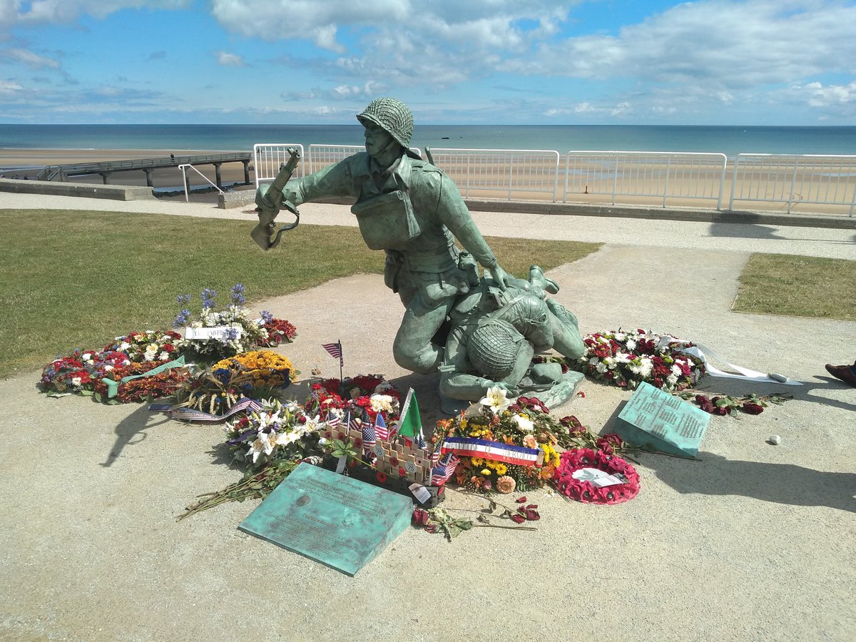 WarwalkerUpdate's tweet image. Pics of 'Bloody Omaha': the sweeping crescent-shaped beach taken from the German defences at Vierville-sur-Mer; memorial to the men of the 29 Div, 116 RCT who fought and died here; German 50mm gun casemate guarding the exit from Easy Red beach