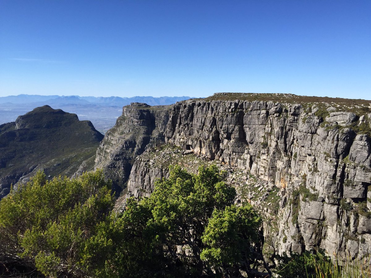 #HardToBelieve we walked the lip of a ledge 3500m above sea level today. No railing. No rope. No regrets. #TravelDiaries #BestDayEver #TableMountain #CapeTown