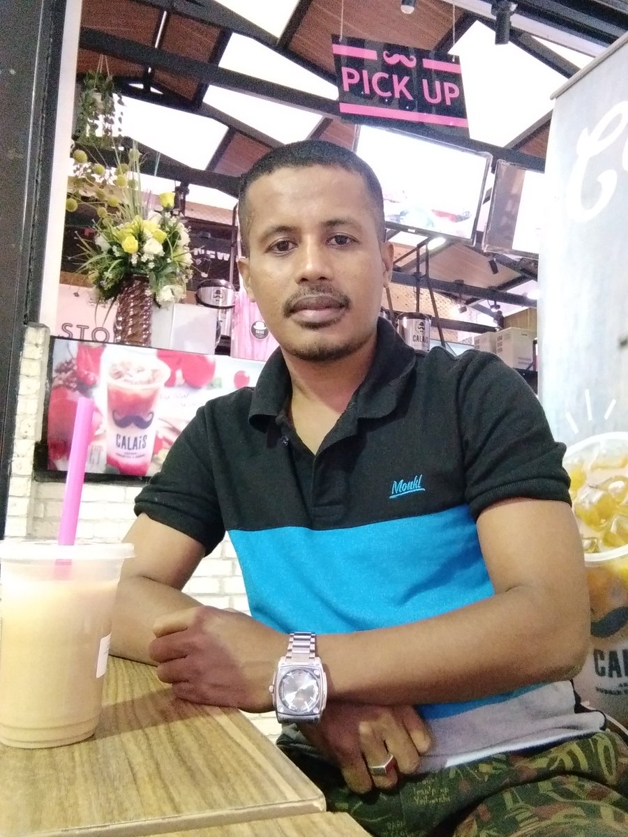 Menikmati segelas Coffee Milk di siang hari..