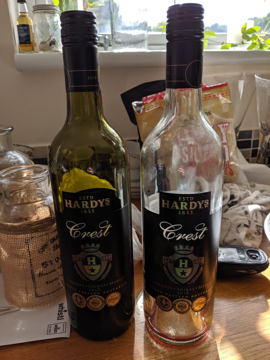 NGreen3's tweet photo. @HardysWineUK we've ended up with one clear bottle, one green (both red wine). Debate now happening as to why... please could you help explain? https://t.co/9s7VOabB8v