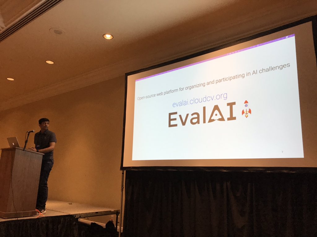 DhruvBatra_'s tweet photo. .@rishabhjain2018 speaking about hosting challenges where participants upload code not data to #EvalAI by @project_cloudcv; at @ai_habitat workshop at #CVPR2019. https://t.co/Yn6vZXEVzt