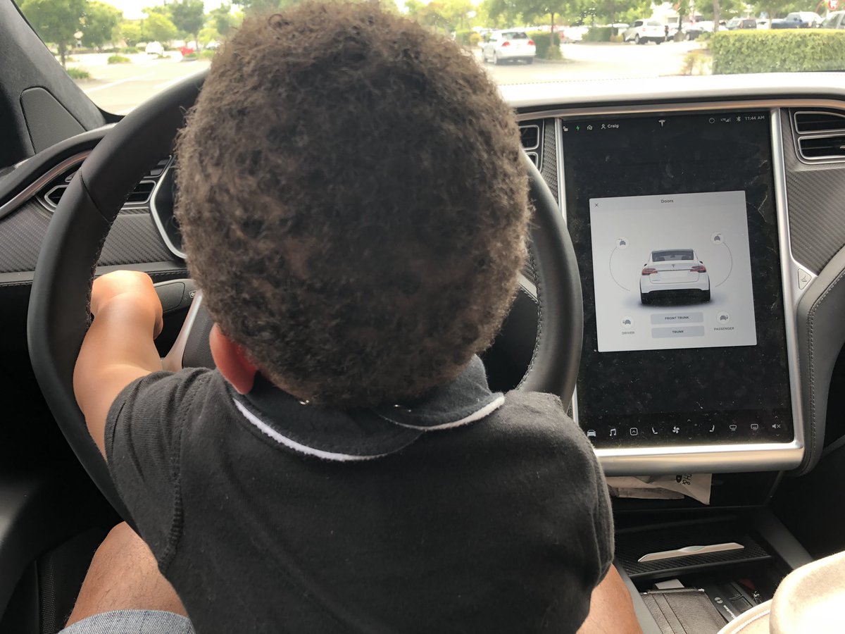 CraDav's tweet photo. Hey .@elonmusk and @Tesla. How about a #childmode? My toddler can sit on my lap while supercharging. All normal  cabin functions are inoperable except for the sound effects when he turns the wheel or pulls on the turn signal “Vroom!” https://t.co/XT7YrU13Ii