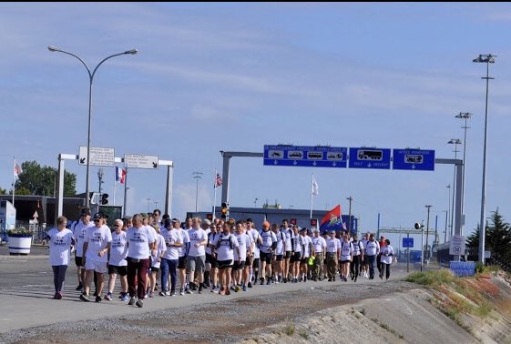 A great shot of the <a href="/RUNTOPEGASUS/">Run To Pegasus</a> runners leaving Ouistreham Ferry Port on their way to #Pegasus Bridge on the morning of #DDay75..... #DDay #Normandy #Heroes