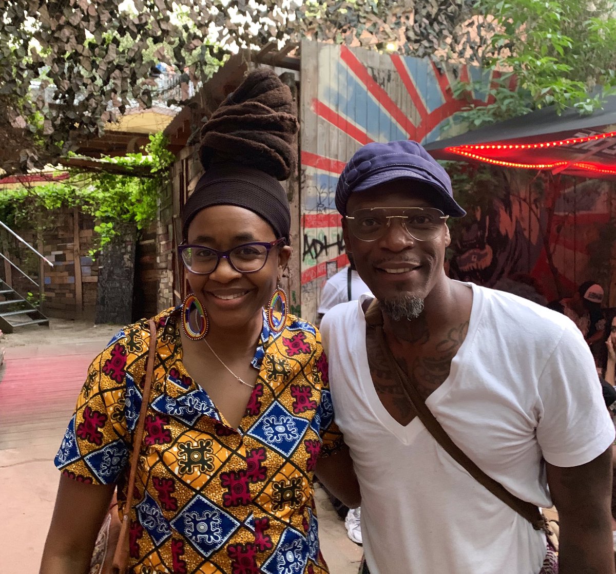Nnedi's tweet photo. I got to meet rapper M1 from Dead Prez in Berlin, Germany yesterday. Also got to see him perform. 😃Let’s Get Free is one of my all time favorite rap albums. ✨🎤 #Afrolution https://t.co/5EmdspAlcU