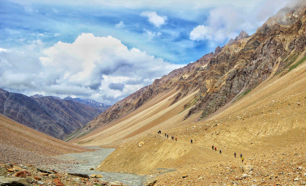 TRLT2016's tweet photo. On day 4 you will be conquering steep slopes and navigate through the high #mountain #passes connecting #Bhaba and #Pin_valleys. The trail is a combination of #moraine, #glacier and #scree The most #highlight of this trek is you will notice the sudden shift in #landscape. #trlt https://t.co/Sk7Lw5y7Qu