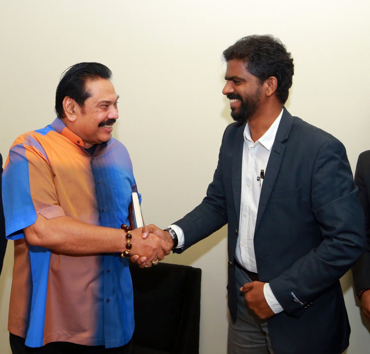 RajapaksaCenter's tweet photo. International Affairs Editor of @the_hindu, @johnstanly presenting his book ‘The ISIS Caliphate’ to @PresRajapaksa after the inaugural event of the Mahinda Rajapaksa Center, ‘The Global Expansion of ISIS: Impact on Sri Lanka’ on 9th June in Colombo. #MRCenter https://t.co/KzLJji75TC