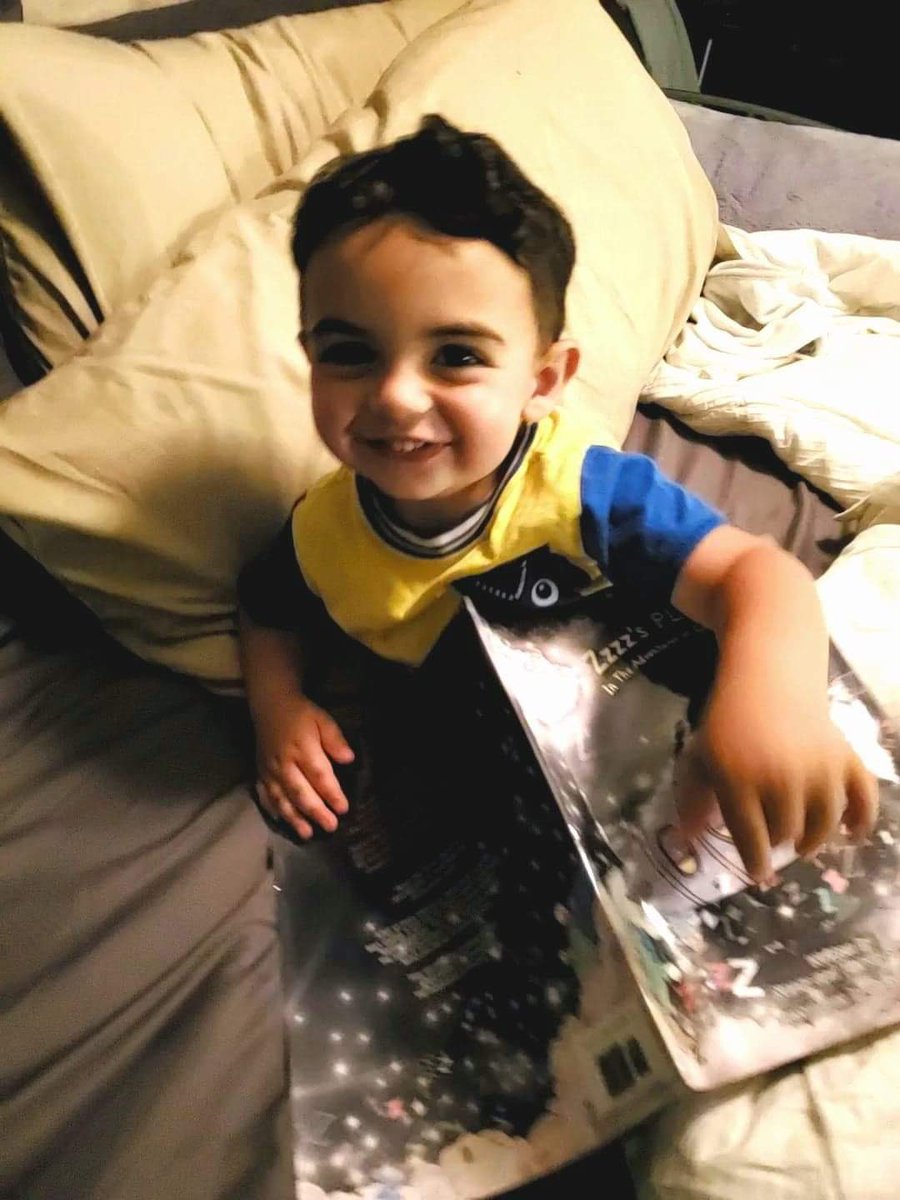 SwernNancy's tweet image. My youngest reader yet!  His mommy sent me this photo to let me know it’s his bedtime favorite book.  And what a beautiful boy!
How old do you think he is?