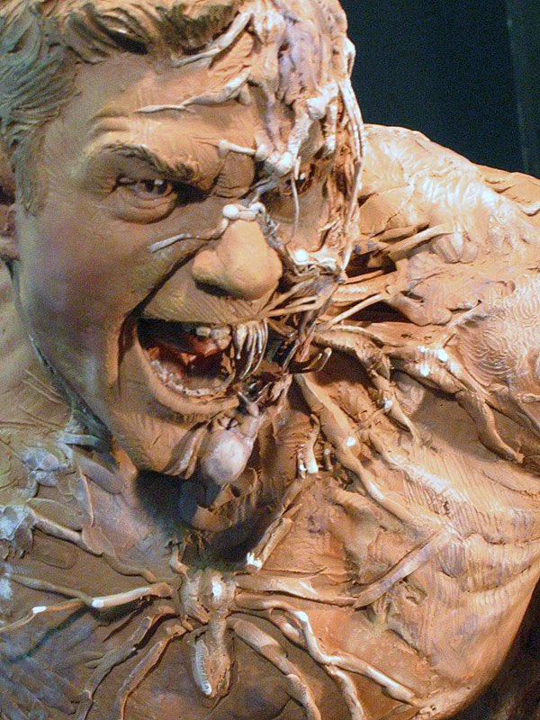 A very horrifying statue of Eddie turning into Venom.