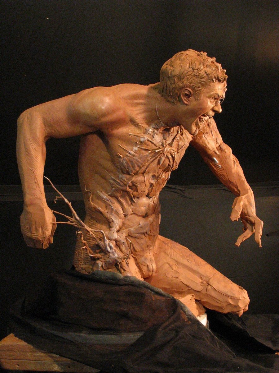 A very horrifying statue of Eddie turning into Venom.