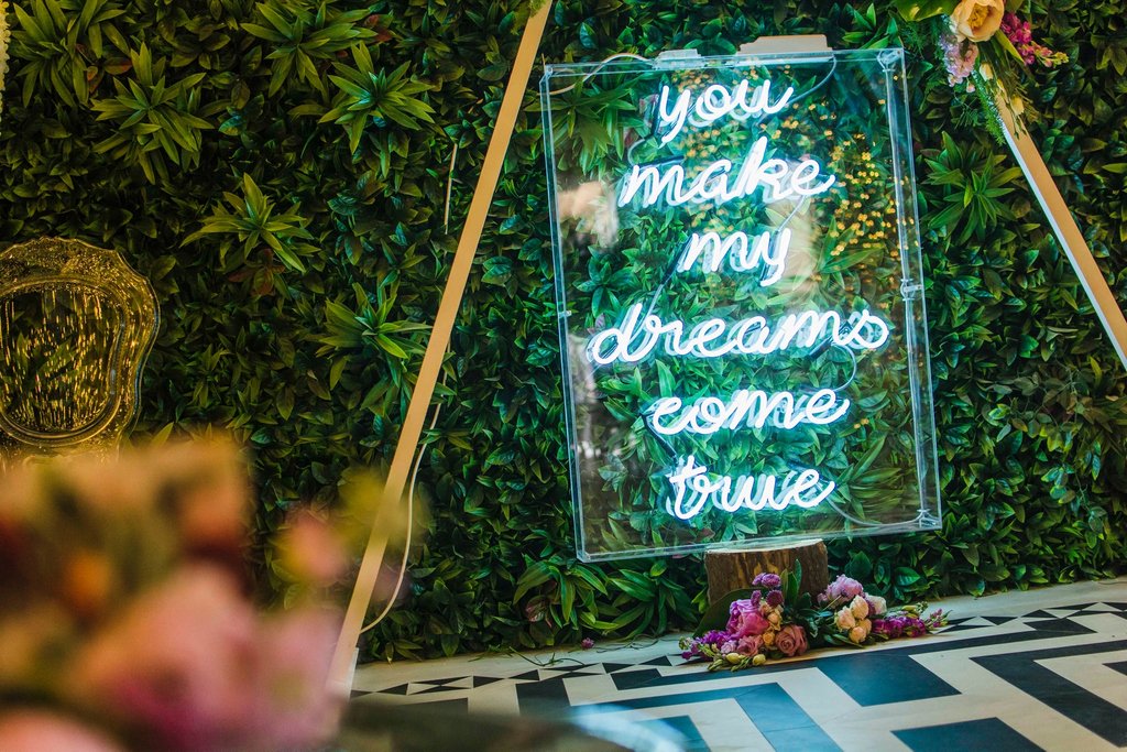 #MondayMotivation | A cute quote to start the week... What cooler way to display it than with neon and flowers?