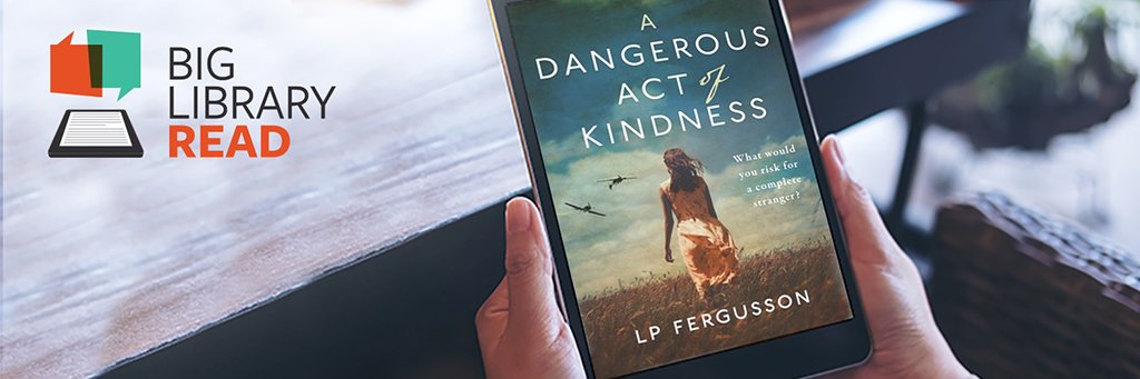 a man is holding a tablet which is featuring a book cover