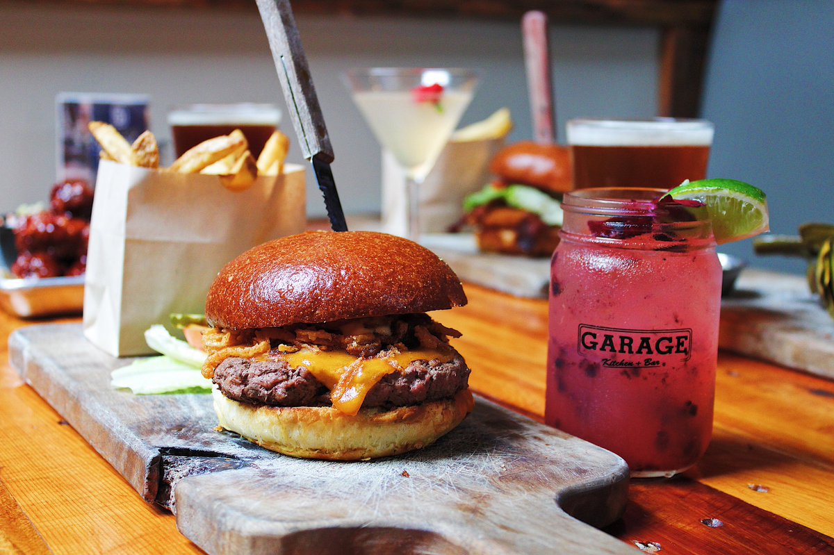 garagebarsd's tweet photo. Our “Butchers Burger” is one of the most popular items on the menu. It is a blend of bison, wild boar &amp; grass fed angus topped with bacon jam, crispy shallots &amp; cheddar cheese. Pair with one of our refreshing speciality cocktails for a truly memorable meal!
#garagekitchenandbar https://t.co/7TeZsEJszP
