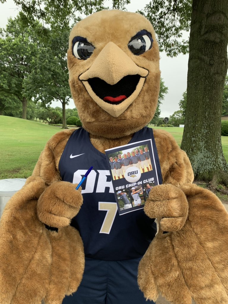 ORUAthletics's tweet photo. It’s #NationalMascotDay! Eli says, “Join the ORU Golf Chip-In Club TODAY!” #GoldenStandard #ORUGolf https://t.co/0Zb0ZpmGxg