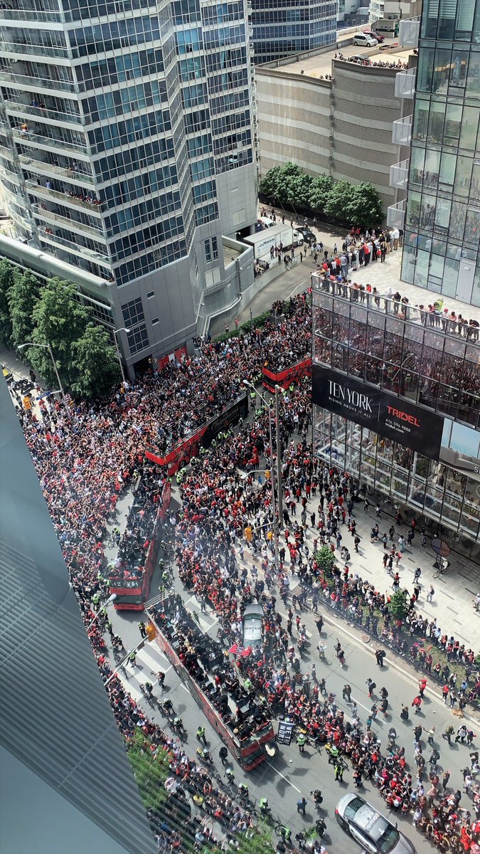 Congratulations to the <a href="/Raptors/">Toronto Raptors</a> for winning the #NBAFinals2019! Here's a view of the parade from <a href="/SunLife/">Sun Life</a> headquarters in Toronto. #WeTheNorth #WeTheNorthDay