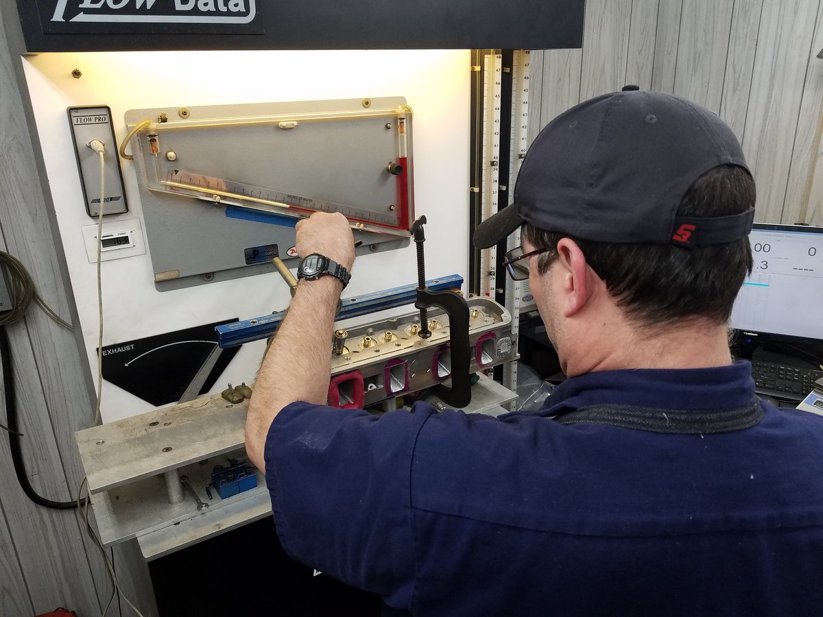 mvt4v's tweet photo. After porting the heads, Craig tests them on the flow bench.

The flow bench measures the amount of air flow in cubic feet per minute (cfm) through cylinder heads. This shows how much improvement was gained by porting the heads.

#trickflow #porting #cfm #cylinderheads https://t.co/40cISsZsP5