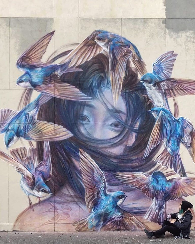 Artist Announcement📣: Emily Ding from #Houston draws inspo from flora, fauna &amp; human temperament. Her work is characterized by expressive animals &amp; figures, which come to life through bold color gradients &amp; a fluid, painterly style. 

#JacksonMI #StreetArt #MuralFestival #Murals