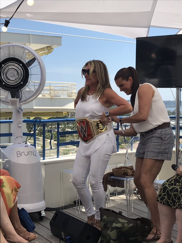 IntFem_'s tweet photo. #SeeHerBeHer ! It’s also critical for Women in sport! So amazing at #CannesLions the famous @StephMcMahon chief of brand of @WWE , champion of catch , offers the #ChiefTroubleMaker championship belt to @ShelleyZalis 👍🏻 https://t.co/X4LU2u52Bw