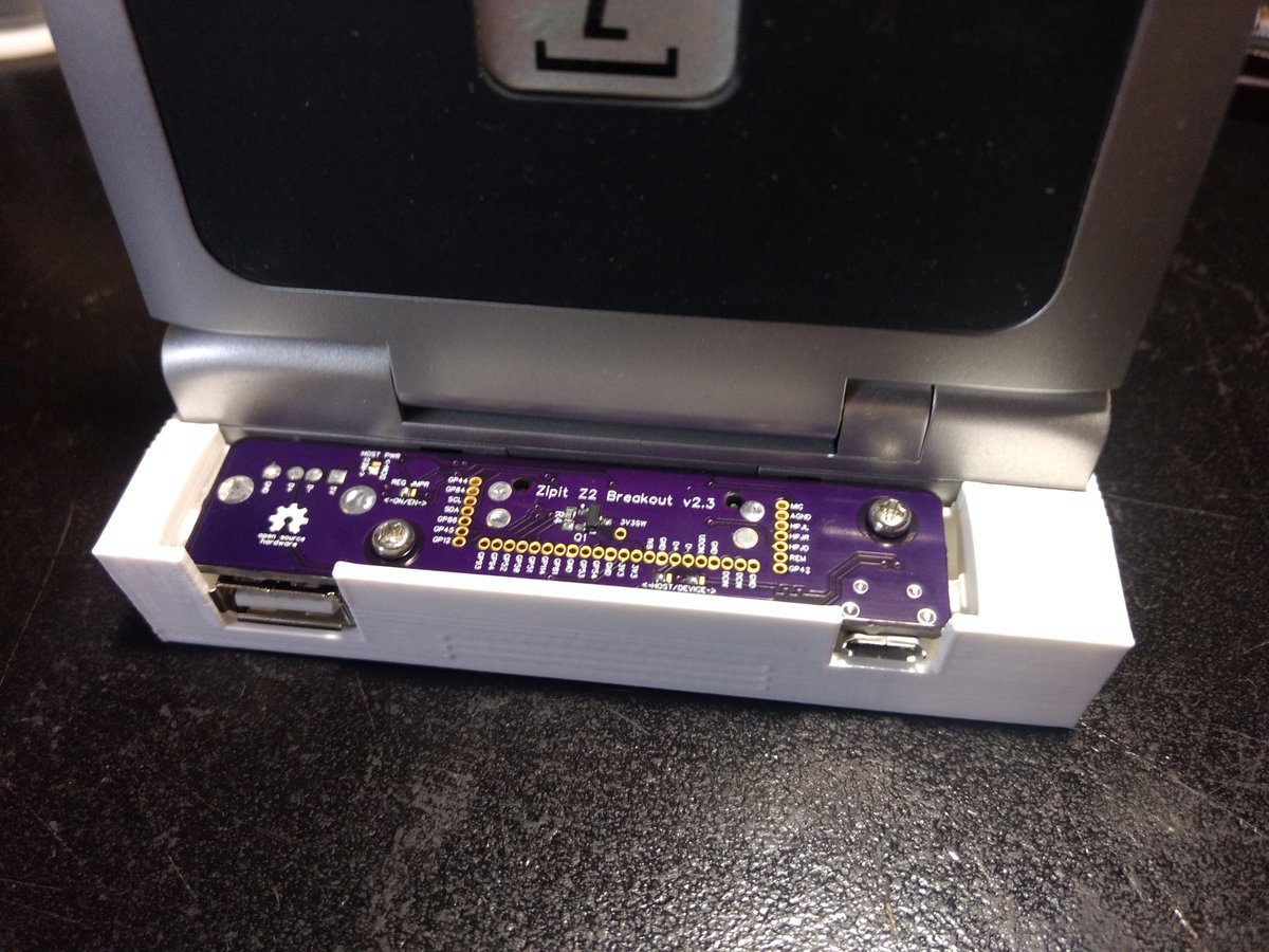 mozzwald's tweet photo. @buZztiaan New #zipitz2 breakout board and dock! Now with screw holes https://t.co/9ixxF31Pvz