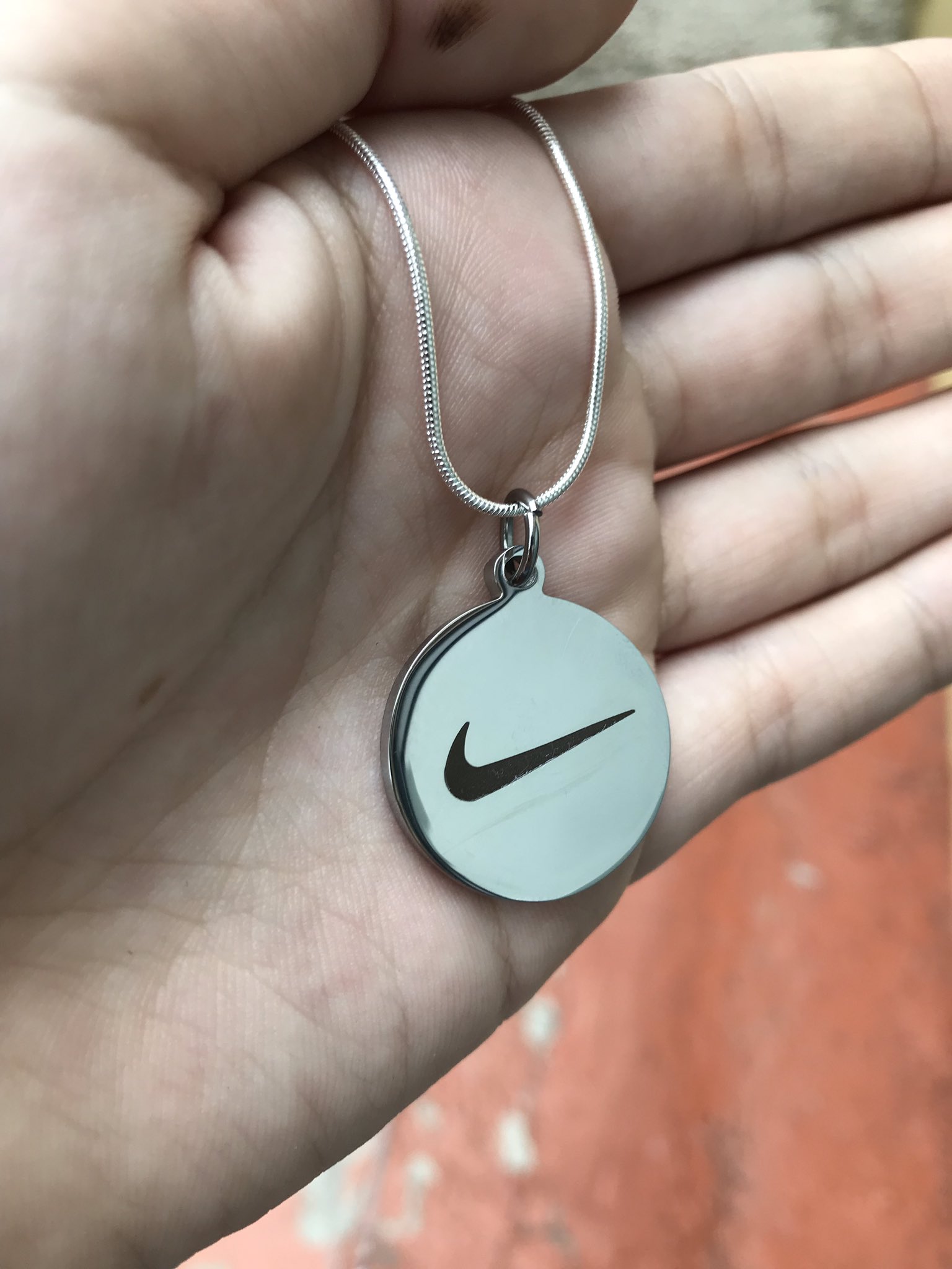 Nike on sale pendant necklace