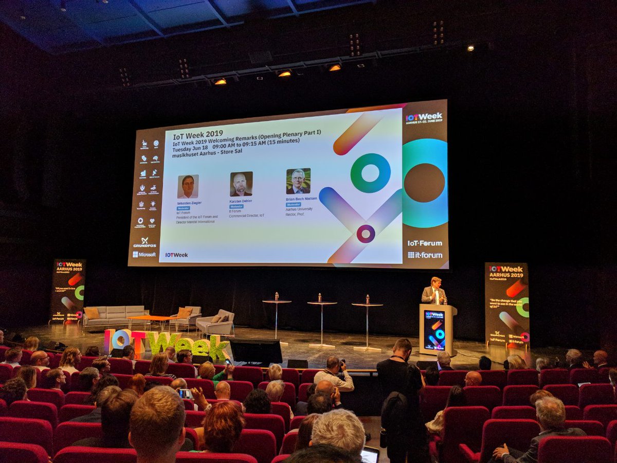 IoT_Forum's tweet photo. Opening Plenary –Welcoming remarks by Sébastian Ziegler, Chairman of IoT Forum, Brian Bech Nielsen, Rector of the Aarhus University and Karsten Dehler, Commercial Director at It-Forum, the local host of the #IoTWeek2019 conference. https://t.co/WuMgS2vf6F