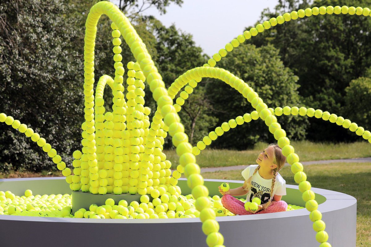 WimbledonFdn's tweet photo. We've teamed up with @WaterAidUK to create a fountain of 2,631 tennis balls in Greenwich Park, London.

That's the number of lives that could be saved each day if everyone everywhere had clean water and decent toilets. 

#TeamWater https://t.co/kGI9yUO1PT