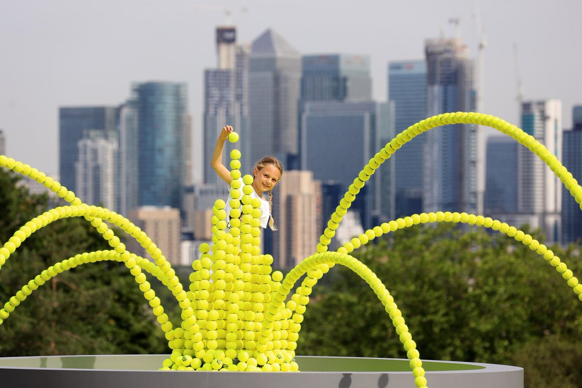 WimbledonFdn's tweet photo. We've teamed up with @WaterAidUK to create a fountain of 2,631 tennis balls in Greenwich Park, London.

That's the number of lives that could be saved each day if everyone everywhere had clean water and decent toilets. 

#TeamWater https://t.co/kGI9yUO1PT