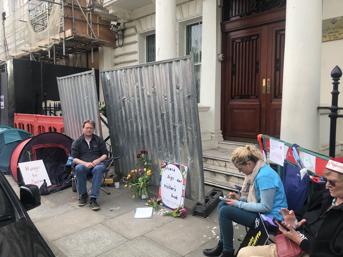 Howell Productions (@howellprod) on Twitter photo This morning the Iranian Embassy decided to rearrange their barriers, blocking off the tree of hope and it’s messages and hiding behind the walls. Enough is enough! #bringnazaninhome #freeNazanin <a href="/TulipSiddiq/">Tulip Siddiq</a> <a href="/PeyvandCorsandi/">Peyvand Khorsandi</a> <a href="/ShappiKhorsandi/">Shaparak Khorsandi شاپرک خرسندی</a> <a href="/FreeNazanin/">Free Nazanin</a> This morning the Iranian Embassy decided to rearrange their barriers, blocking off the tree of hope and it’s messages and hiding behind the walls. Enough is enough! #bringnazaninhome #freeNazanin <a href="/TulipSiddiq/">Tulip Siddiq</a> <a href="/PeyvandCorsandi/">Peyvand Khorsandi</a> <a href="/ShappiKhorsandi/">Shaparak Khorsandi شاپرک خرسندی</a> <a href="/FreeNazanin/">Free Nazanin</a>