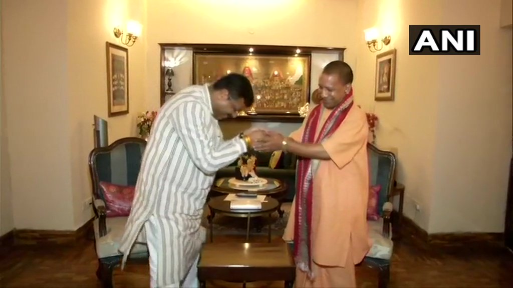 ANI's tweet image. Uttar Pradesh Chief Minister Yogi Adityanath meets Union Minister Dharmendra Pradhan in Delhi.